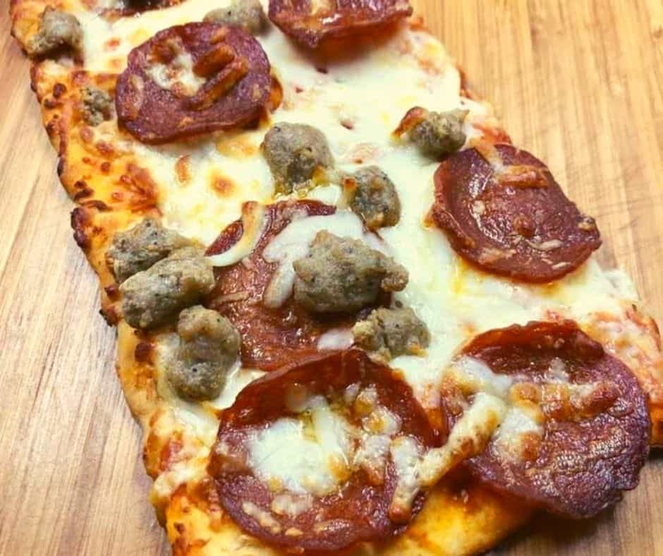How about making an entire Air Fryer Pepperoni and Sausage Flatbread Pizza in minutes? 