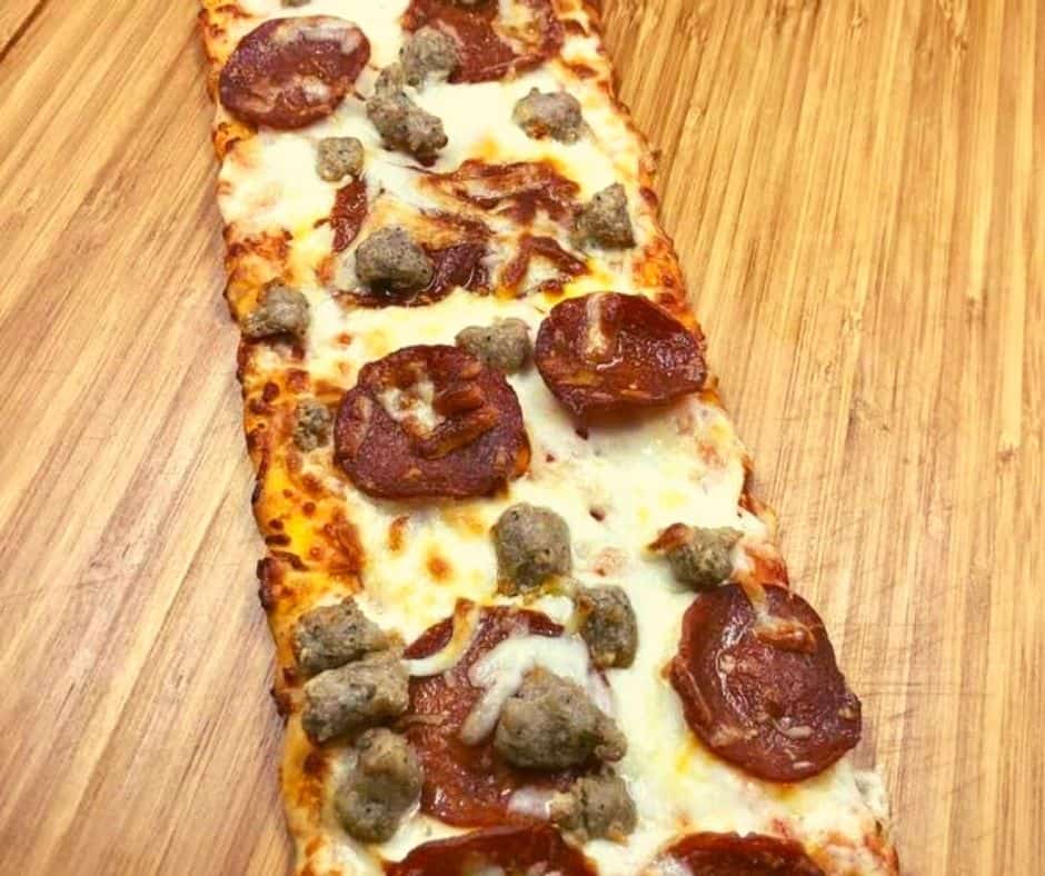 How about making an entire Air Fryer Pepperoni and Sausage Flatbread Pizza in minutes? 
