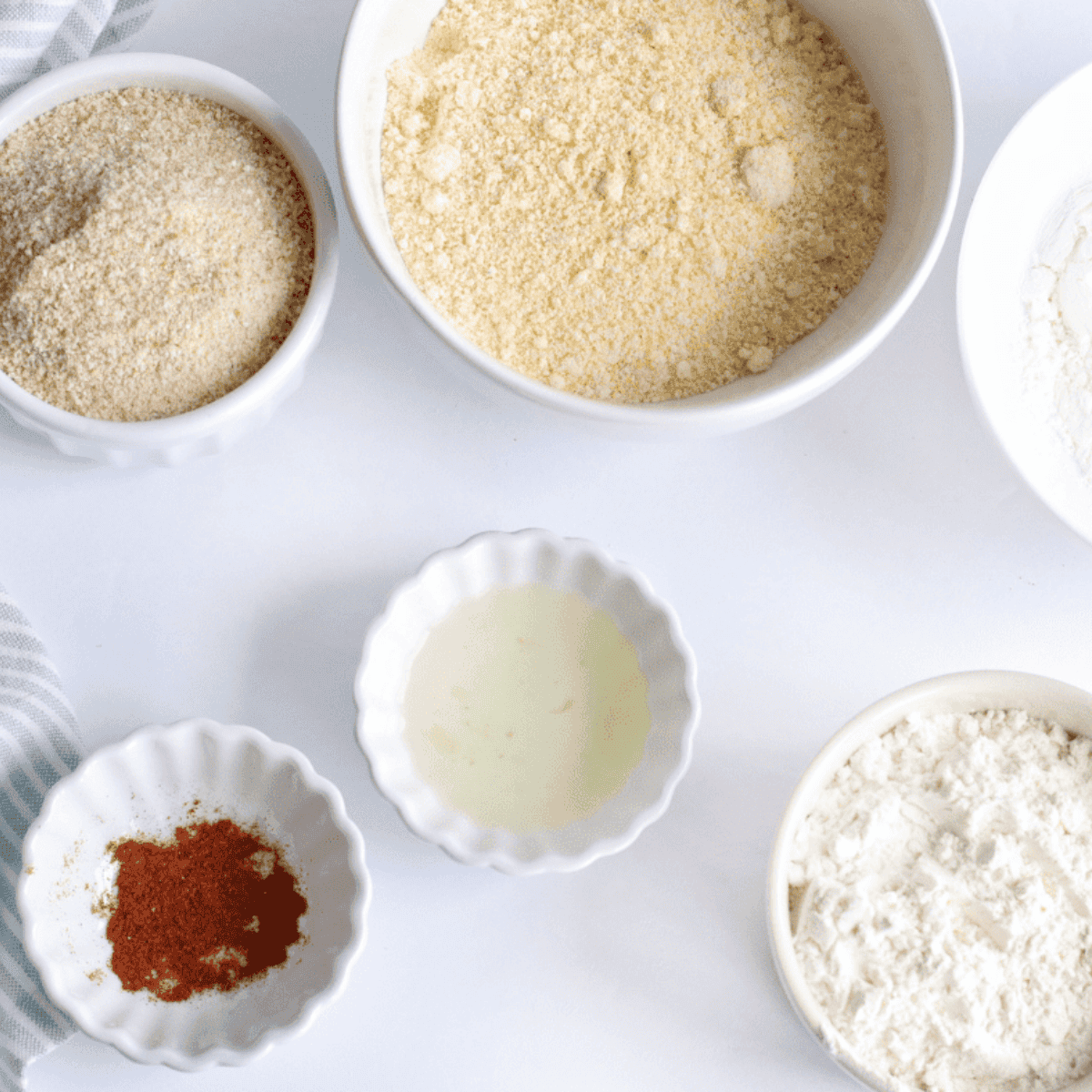Ingredients needed for Arthur Treacher’s Fried Shrimp Recipe on kitchen table.