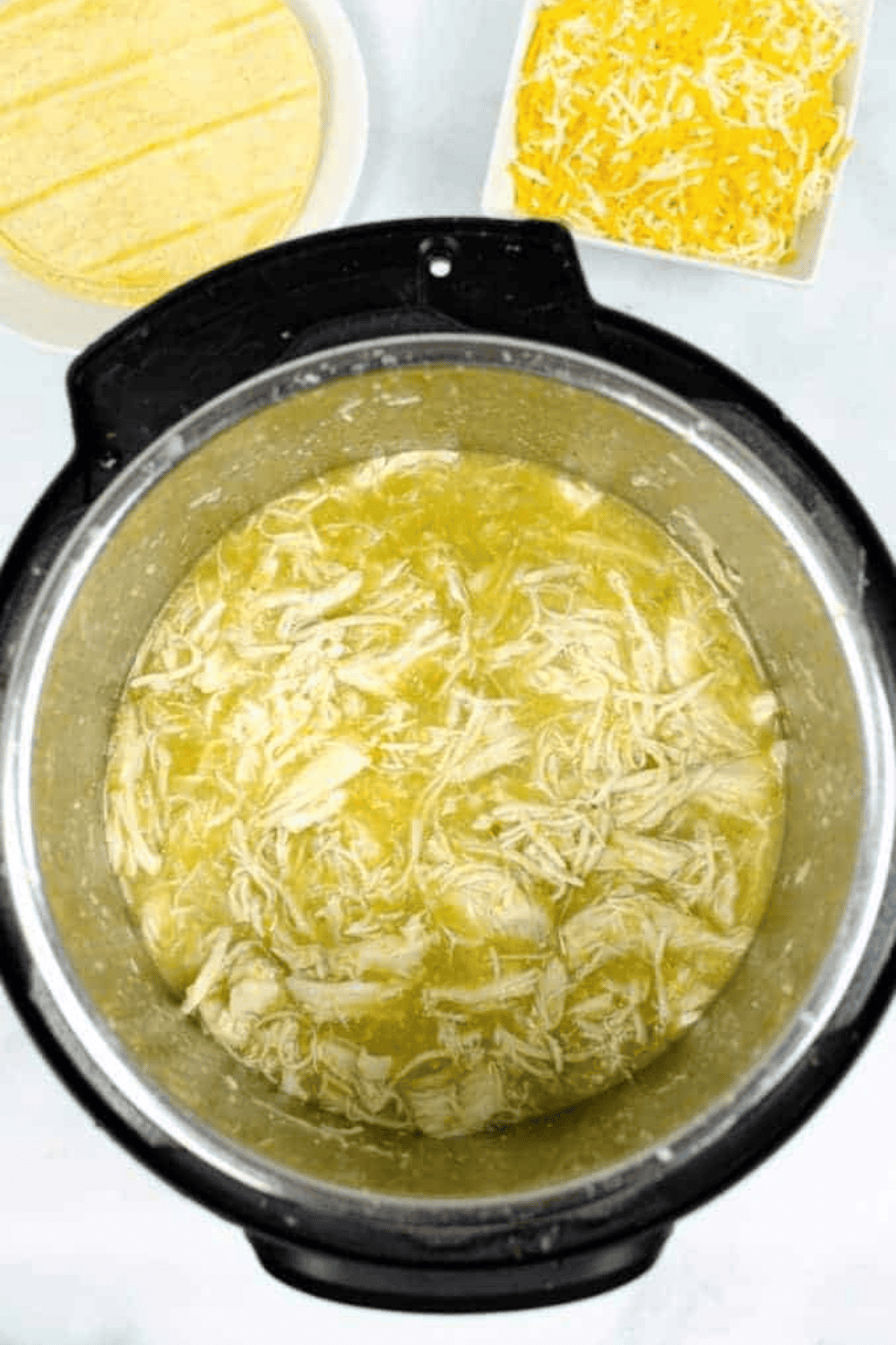 All of the ingredients inside the pressure cooker.