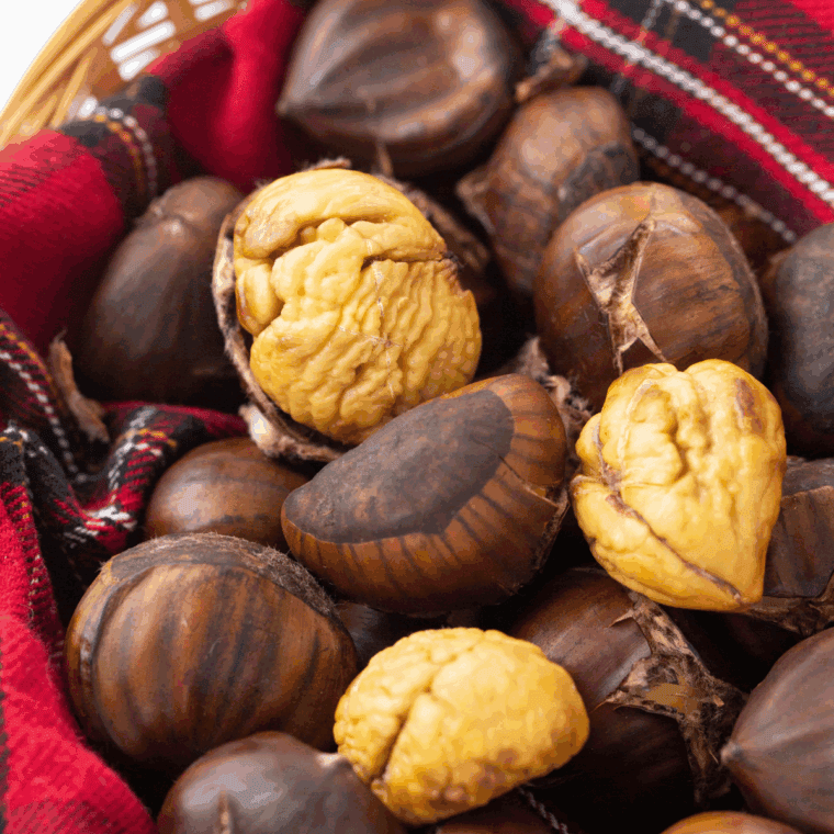 Bowl of perfectly roasted and peeled chestnuts made in an air fryer.