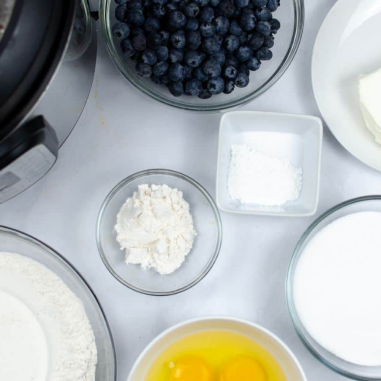 Ingredients needed for Instant Pot Blueberry Loaf on kitchen table.