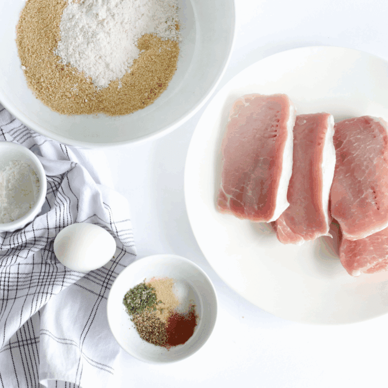Ingredients needed for Air Fryer Mexican Pork Chops on kitchen table.