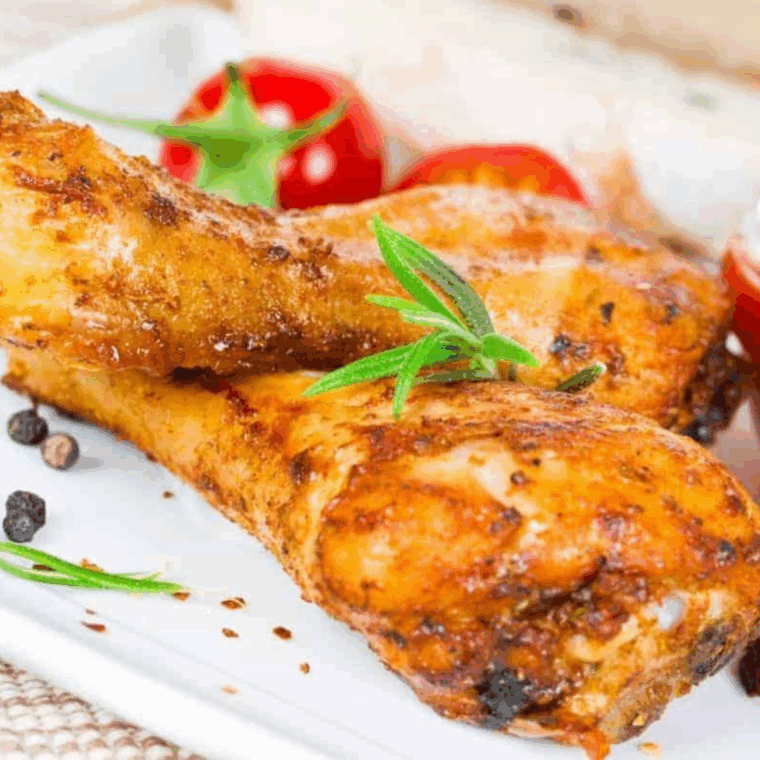 Plate of Easy Crispy Baked Lemon Pepper Chicken Drumsticks (Legs).