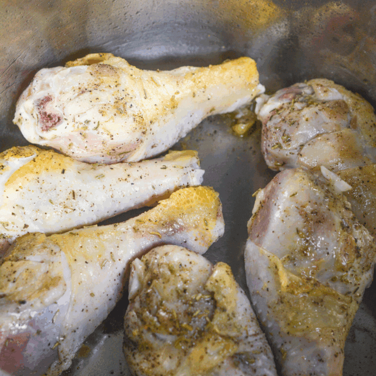 Place chicken drumsticks into the Instant Pot.