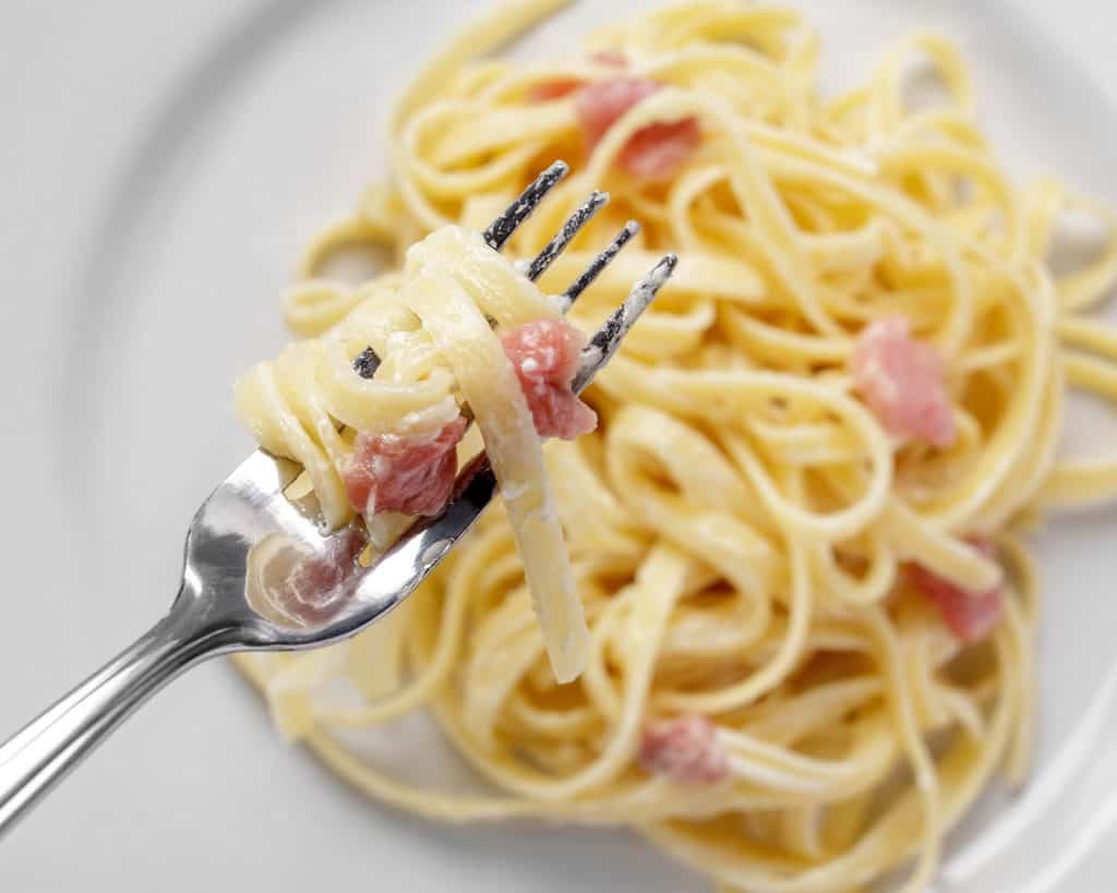 Intro: Pasta Carbonara is a beloved Italian classic known for its simplicity and incredible flavor. This recipe combines al dente pasta with a rich, creamy sauce made from eggs and a blend of cheeses, along with the savory goodness of pancetta or guanciale. It's a delightful dish that comes together quickly, making it perfect for a satisfying weeknight dinner or special occasions.