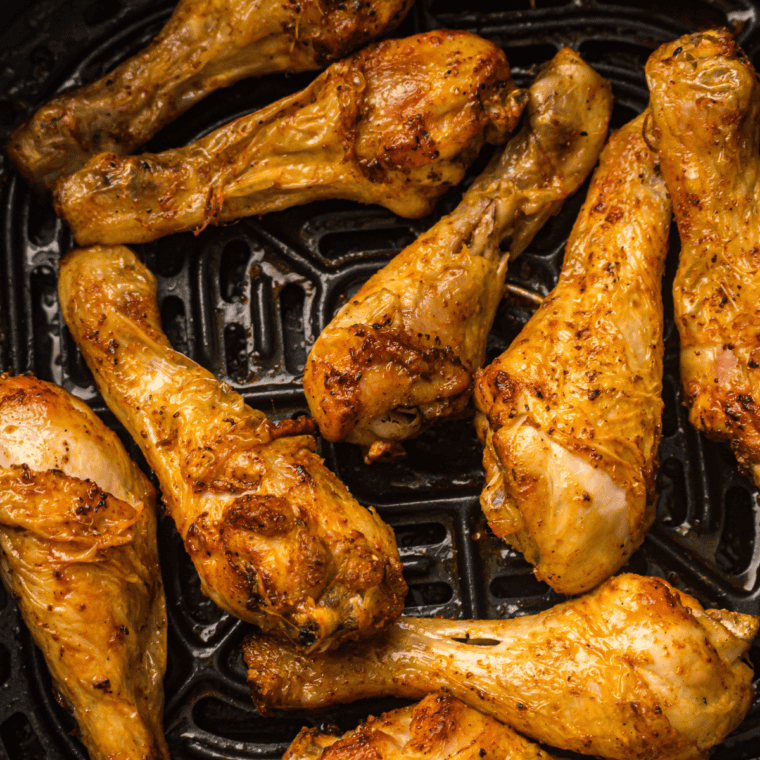 Cooked Air Fryer Frozen Chicken Drumsticks with crispy skin and juicy meat.