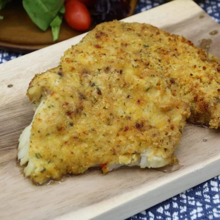 Air Fryer Parmesan Crusted Cod on cutting board.