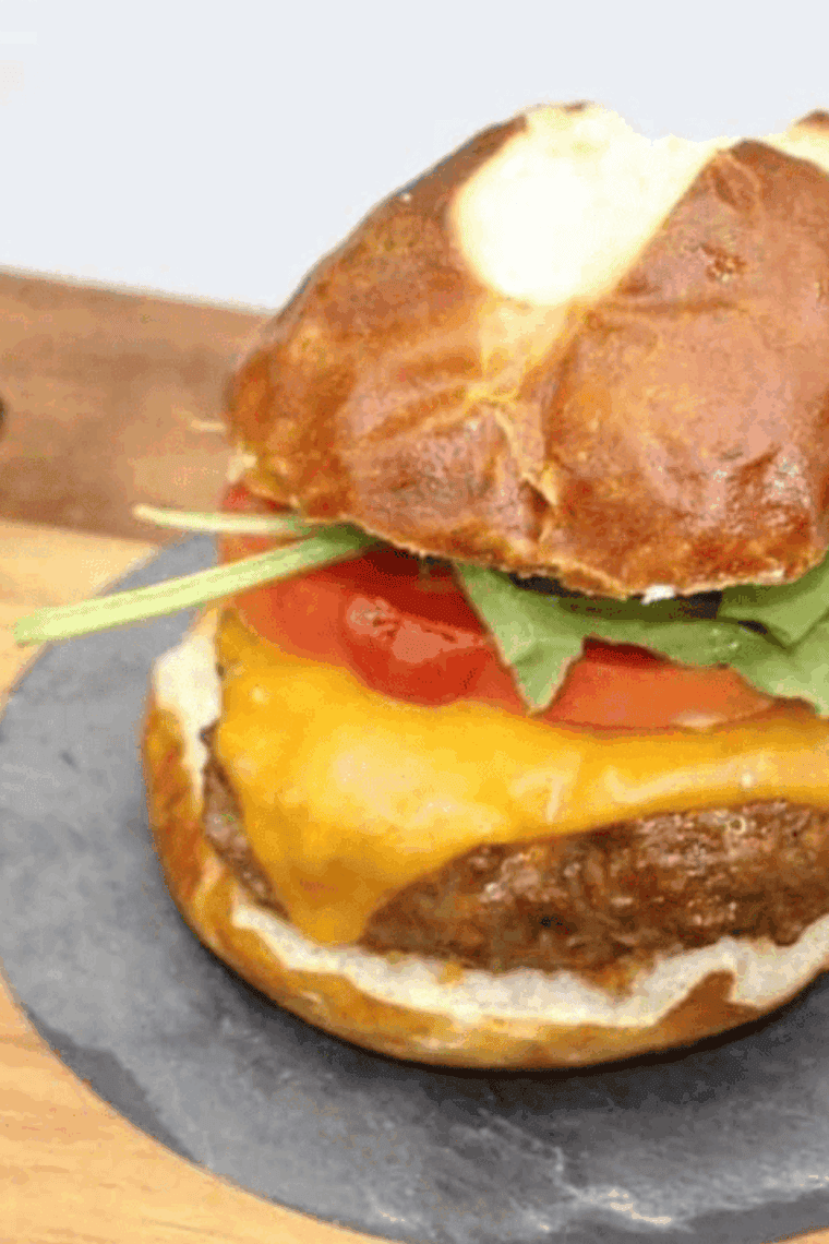 Juicy homemade Arby’s BBQ Bacon Burger with melted cheese and smoky bacon on a golden bun.
