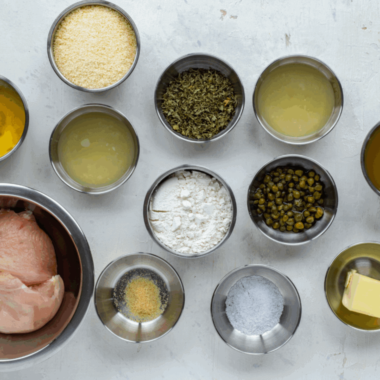 Ingredients needed for Carrabba’s Chicken Piccata Recipe on kitchen table.
