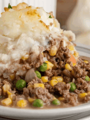 Decadent Cheesecake Factory Shepherd's Pie copycat topped with creamy Parmesan mashed potatoes.