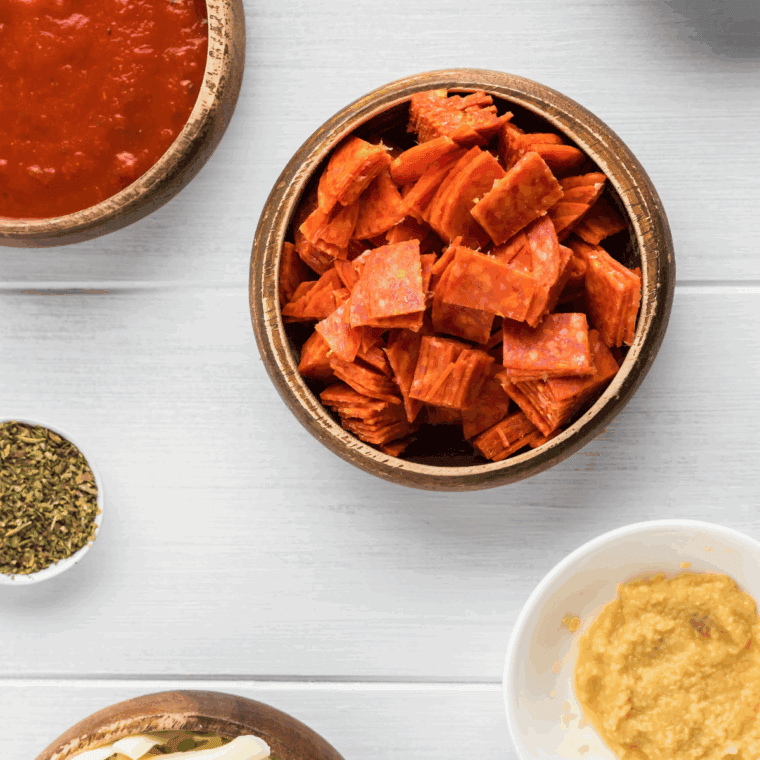 Ingredients needed for Dominos Pepperoni Stuffed Cheesy Bread Recipe on kitchen table.