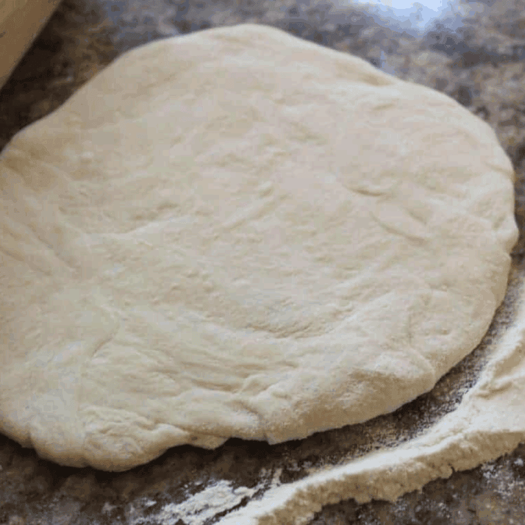 Roll out the dough on a lightly floured surface.