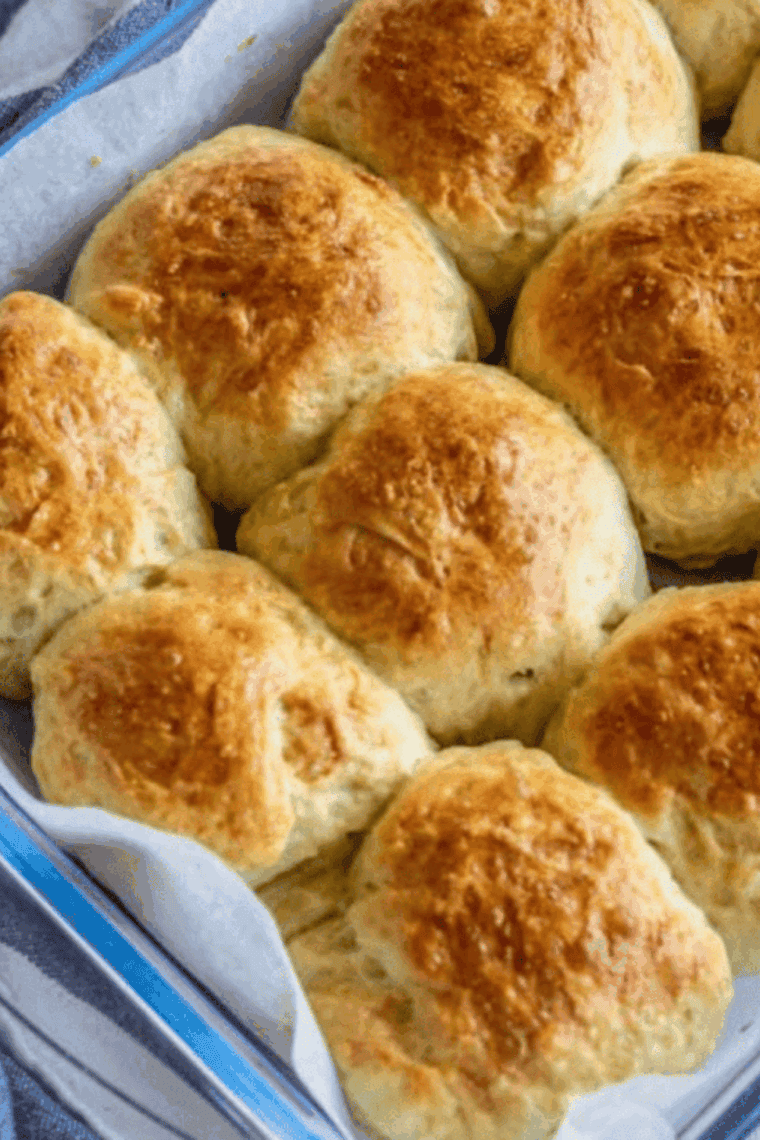 freshly baked golden brown dinner rolls in an Instant Pot