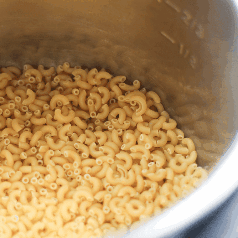 Place Boxed Macaroni and Cheese into the Ninja Foodi.