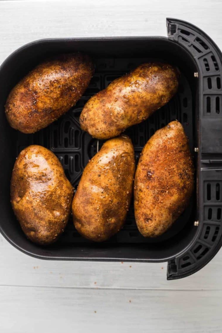 Step-by-step process for making Air Fryer Potato Skins, featuring frozen potato skins, cheese, and toppings.