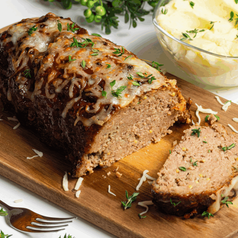 Homemade Joanna Gaines Meatloaf fresh out of the oven, sliced and ready to serve.