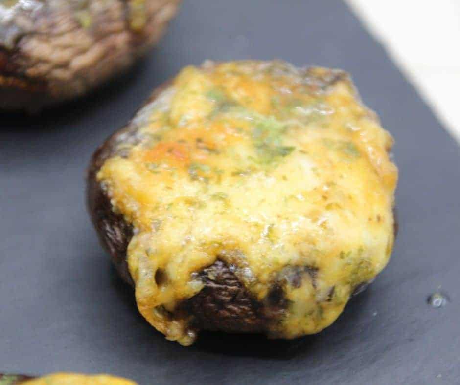 Air Fryer Cheese Stuffed Mushrooms are one of my favorite appetizers, a low-carb and KETO friendly recipe. That is really going to impress your guests. I stuffed these mushrooms with a blend of cheese, and then brushed some butter and seasonings on top, the result, a tender and delicious Air Fryer Cheese Stuffed Mushrooms!