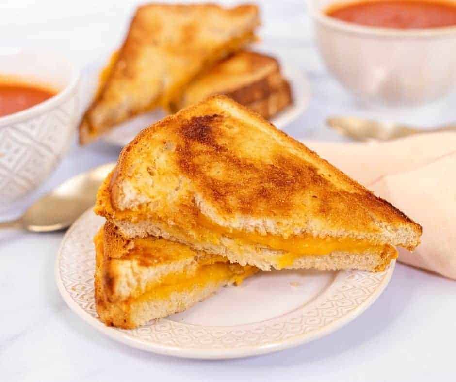 sliced air fryer grilled cheese on a plate