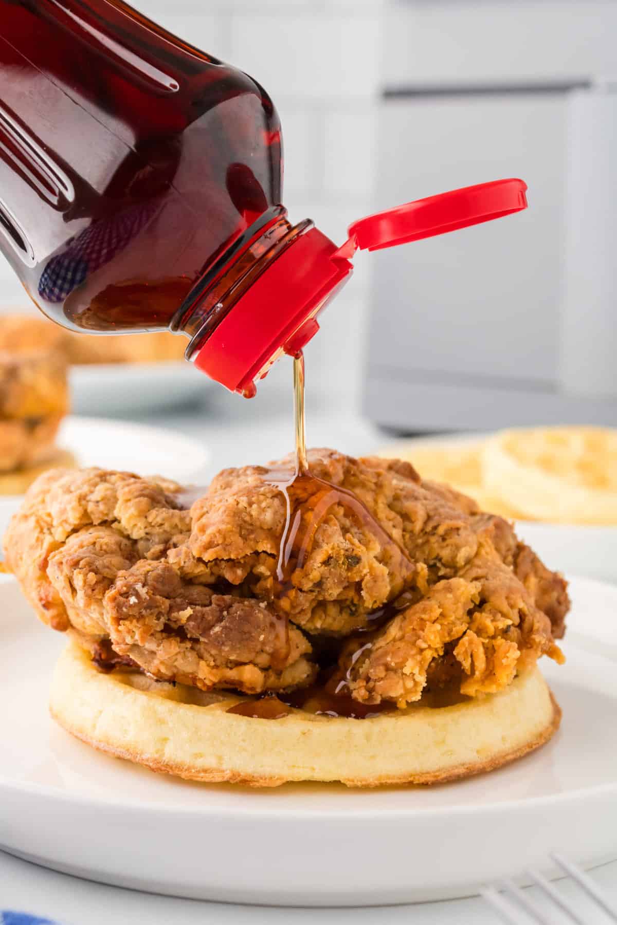 Creating the perfect Air Fryer Chicken and Waffles involves a few pro tips to ensure the best results every time: Marinate for Flavor and Tenderness: Allow the chicken to marinate in buttermilk for at least 30 minutes or overnight. This tenderizes the chicken and infuses it with flavor. Ensure Even Coating: When dredging the chicken in the flour mixture, ensure each piece is evenly coated for a uniform, crispy crust. Preheat the Air Fryer: Always preheat the air fryer before adding your chicken. This helps achieve a crispy exterior and evenly cooked interior. Avoid Overcrowding: Cook the chicken in batches if necessary. Overcrowding can lead to uneven cooking and a less crispy texture. Flip the Chicken: Halfway through cooking, flip the chicken pieces to ensure they brown evenly on both sides. Rest the Chicken: Let the chicken rest for a few minutes after cooking. This allows the juices to be redistributed, resulting in juicier meat. Waffle Batter Consistency: Follow the waffle mix instructions carefully for the best results. The batter should be smooth but not too runny. Customize Waffle Flavor: Feel free to add ingredients to your waffle batter, like vanilla extract for sweetness or herbs for a savory twist. Keep Waffles Warm: If you’re making multiple waffles, keep them warm in a low oven while cooking the rest. Serve Immediately: Air Fryer Chicken and Waffles are best enjoyed fresh. Serve them hot with your favorite syrups, sauces, or toppings. Following these tips, you’ll elevate your Air Fryer Chicken and Waffles to a deliciously memorable meal, perfect for any time of the day.