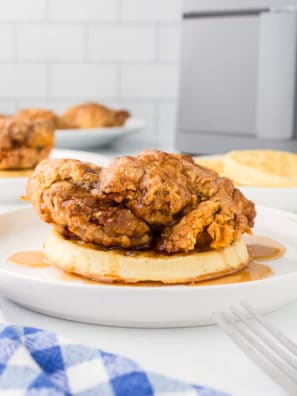 You'll love this Air Fryer Chicken and Waffles recipe for several compelling reasons: Perfect Crispiness: The air fryer excels at cooking the chicken to a perfect crispy texture, giving you that delightful crunch with every bite without the heaviness of traditional frying. Healthier Option: Air frying chicken uses significantly less oil than deep frying, making this a healthier take on classic comfort food. Quick and Convenient: Unlike traditional frying methods, the air fryer speeds up the cooking process, allowing you to enjoy this indulgent meal in less time. Flavorful and Versatile: The combination of savory, spiced chicken with sweet, fluffy waffles creates a beautiful balance of flavors that can be further enhanced with syrups, hot sauce, or your choice of toppings. Perfect for Any Meal: Whether you’re craving a hearty breakfast, a fun brunch, or a comforting dinner, chicken and waffles are versatile enough to fit any mealtime. This is true comfort food that the whole family will love! Easy Cleanup: The air fryer makes cleanup a breeze with less oil splatter and mess than traditional frying methods. Consistency: The air fryer provides consistent heat, ensuring that each piece of chicken is cooked evenly, eliminating the guesswork and potential for undercooked or overly crispy spots. Enjoyable for Everyone: This dish is a crowd-pleaser, delighting kids and adults alike with its unique and delicious combination of flavors and textures. In summary, Air Fryer Chicken and Waffles offer a delightful mix of ease, healthiness, and taste, making it a must-try for anyone looking for a new twist on traditional Southern cuisine.