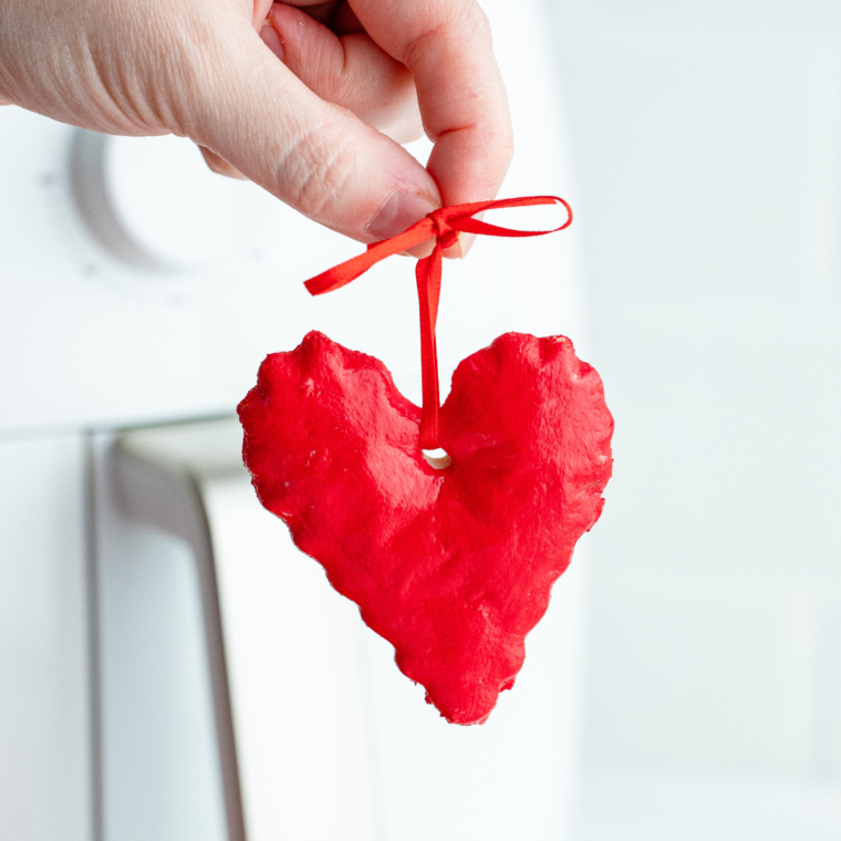 Air fryer salt dough ornaments shaped into stars, hearts, and trees, ready for decoration.