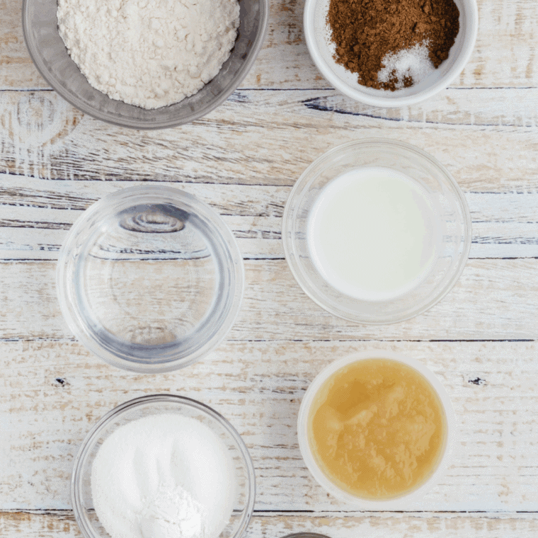 Ingredients needed for Easy Air Fryer Apple Pie Mug Cake on kitchen table.