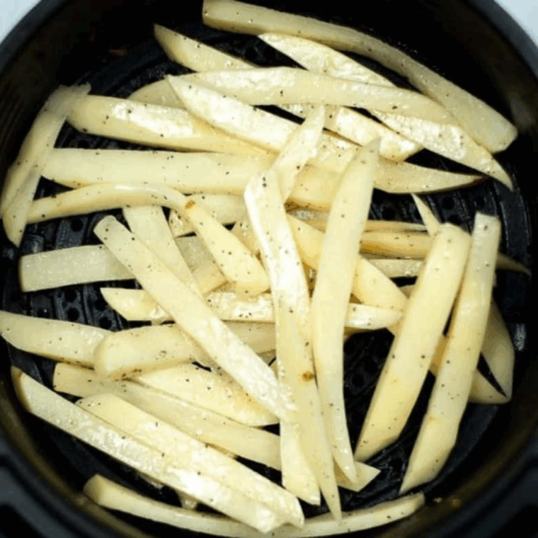 Place the French Fries in the air fryer basket.