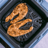 Golden, crispy Air Fryer Salmon Steak, cooked to perfection with a crispy skin.