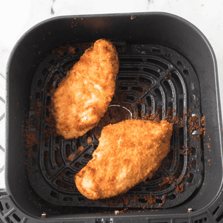 Golden crispy air fryer shake and bake chicken after cooking at 370F