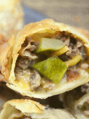 Cheesecake Factory Copycat Cheeseburger Egg Rolls with a crispy golden exterior and savory cheeseburger filling.