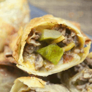 Cheesecake Factory Copycat Cheeseburger Egg Rolls with a crispy golden exterior and savory cheeseburger filling.