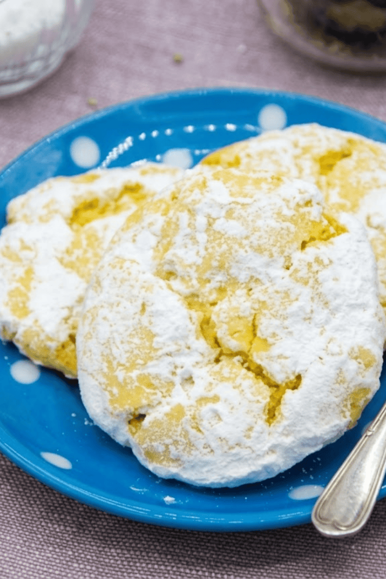 Freshly baked lemon cake mix cookies in the air fryer, soft and golden with a bright citrus flavor.