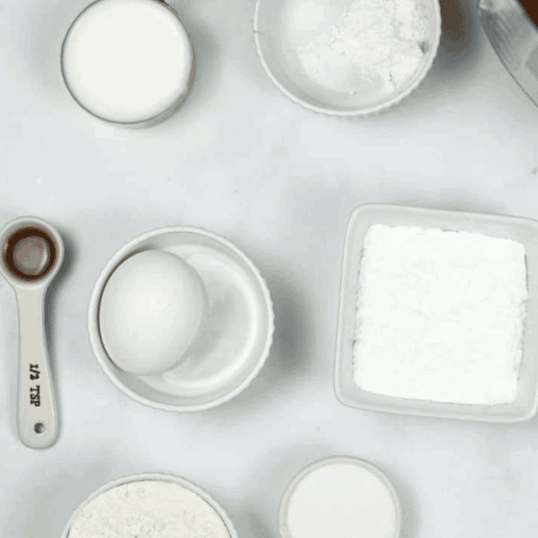 Ingredients needed for Instant Pot Funnel Cakes on kitchen table.
