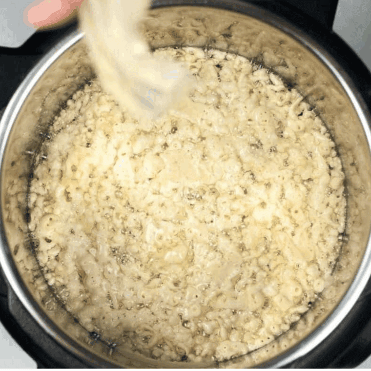 Raw funnel cake batter in pressure cooker bowl.