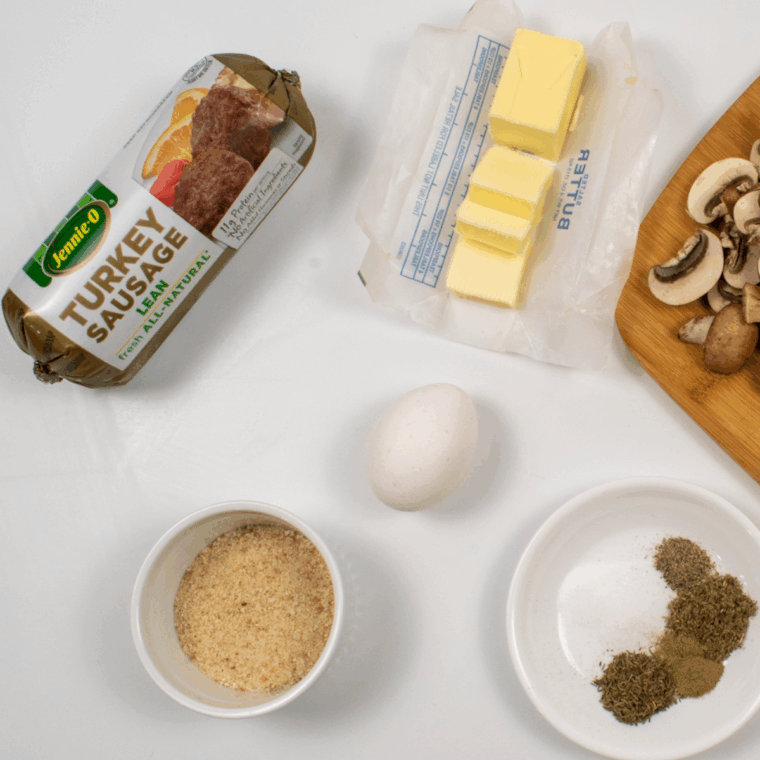 Ingredients needed for Ninja Foodi Spicy Sausage Queso Dip on kitchen table.