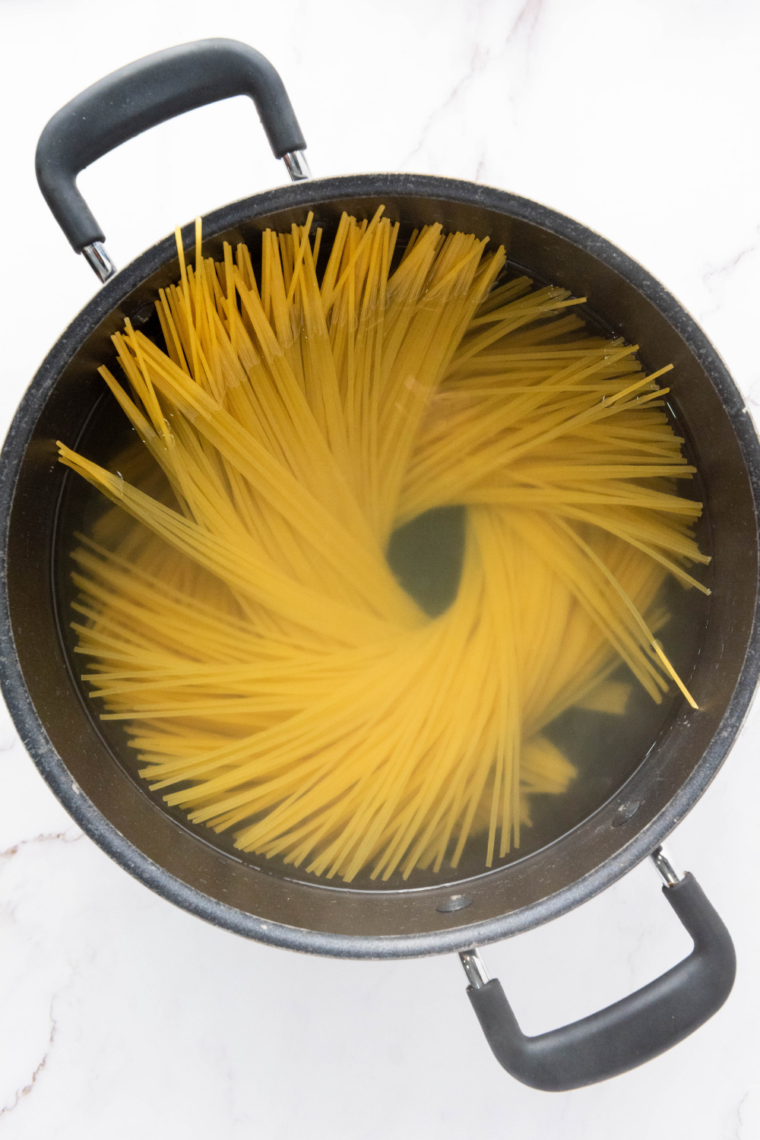 Cook the pasta: Large pot of boiling salted water with spaghetti cooking until al dente.