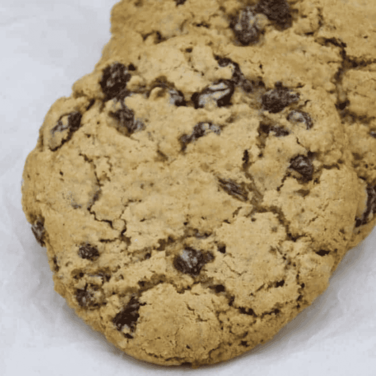 Cooling baked cookies on a wire rack after removing from oven.
