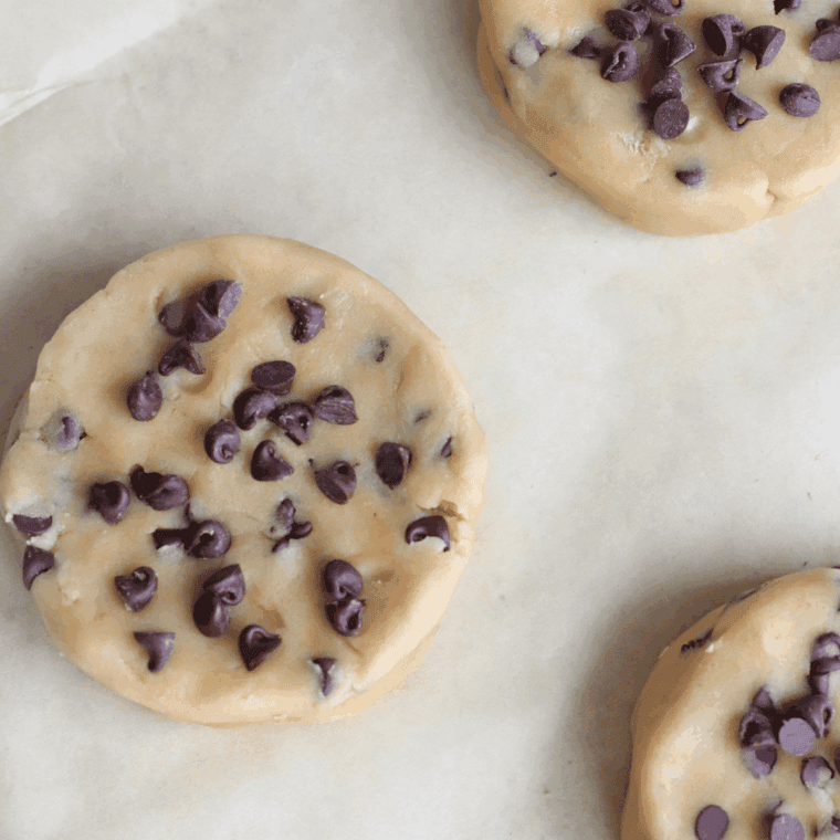 Scooping cookie dough onto the baking sheet, ready to bake.