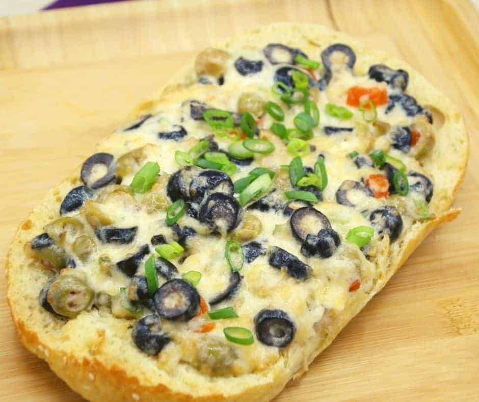 Love cheese? Love bread? Then you're going to love this recipe for olive cheese bread that is cooked in an air fryer! It's easy to make and so delicious. Plus, it's a perfect appetizer for your next party. Give it a try!