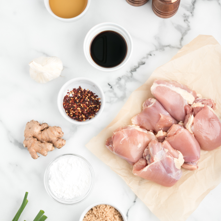 Ingredients for Air Fryer Bourbon Chicken laid out on a countertop.