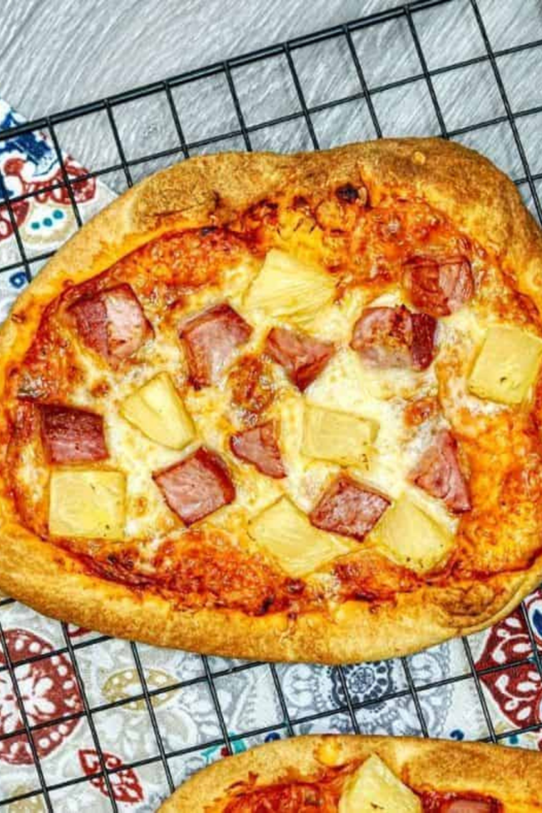 Crispy Air Fryer Hawaiian Pizza Flat Bread with ham, pineapple, and melted mozzarella cheese.