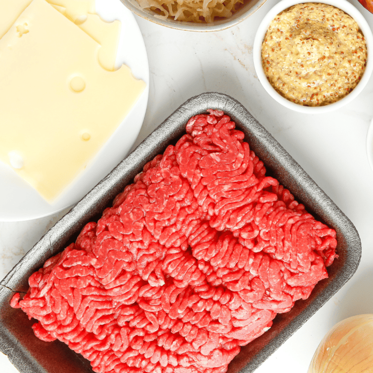 Ingredients needed for Air Fryer Mushroom & Swiss Burgers on kitchen table.