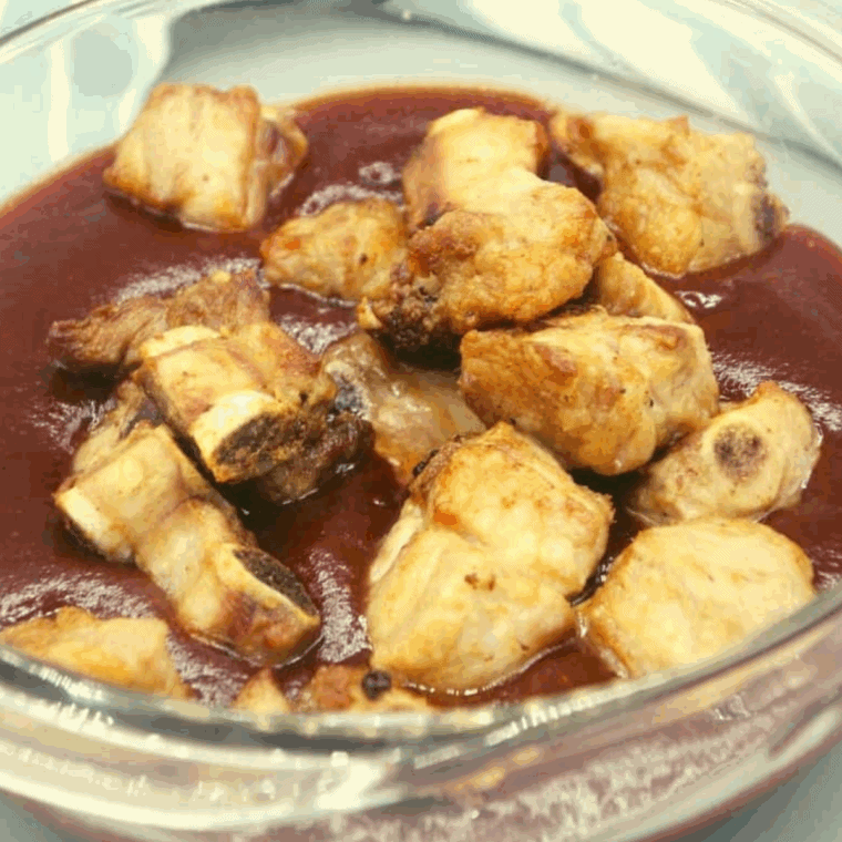 Coat the pork tips in the BBQ sauce.