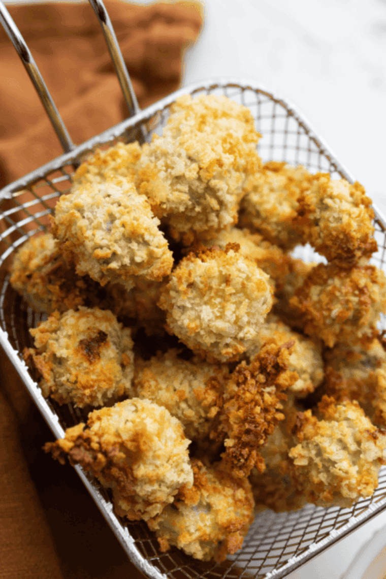 Plate of fried okra with a side of dipping sauce.