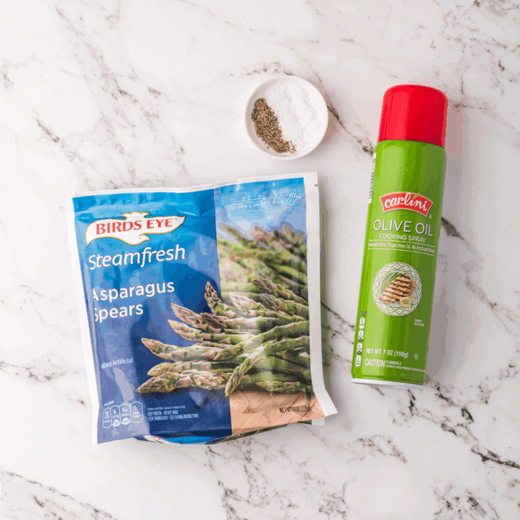 Ingredients needed for How to Air Fry Frozen Asparagus (No Thawing Required!): The Secret to Perfect Crispy Veggies on kitchen table.