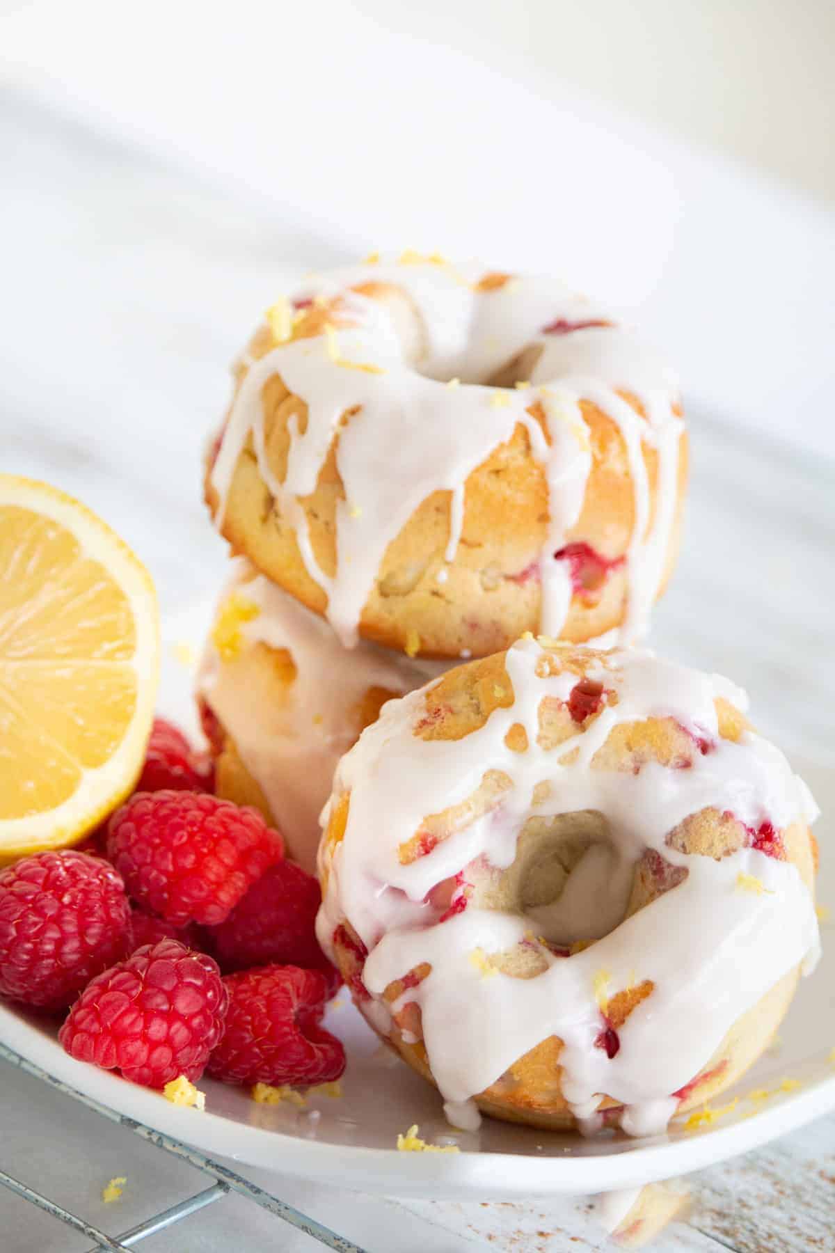 https://forktospoon.com/wp-content/uploads/2021/03/LemonRaspberryDonuts-7-of-10-scaled.jpg