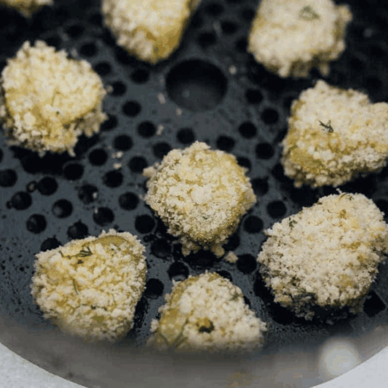 Place Logans Roadhouse Fried Pickle Recipe in the air fryer basket.