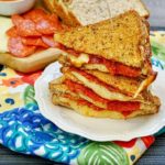 There is nothing better than a grilled cheese sandwich and a pepperoni pizza. What if you mix them up to come up with an Air Fryer Grilled Cheese Pizza Sandwiches. This will soon become one of your favorite meals in the air fryer.