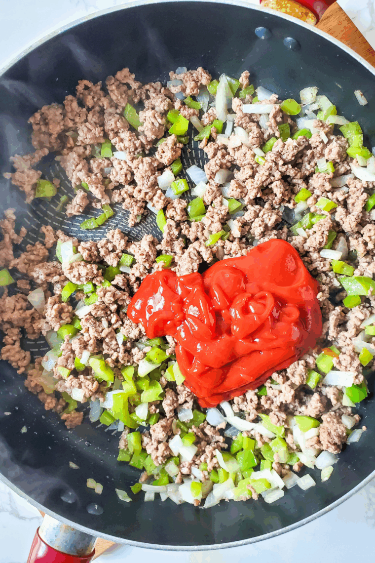 Browning ground beef in a skillet for sloppy joe filling